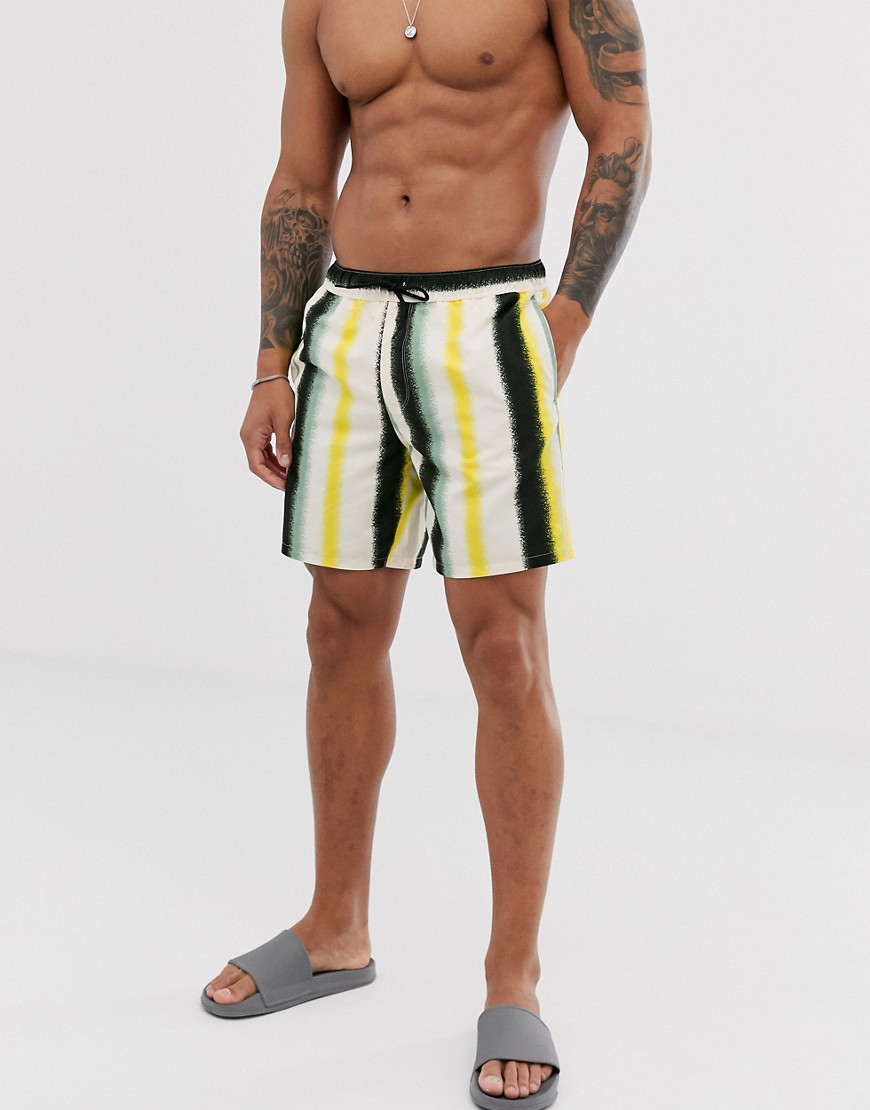 ASOS DESIGN swim shorts in yellow and green stripe mid length