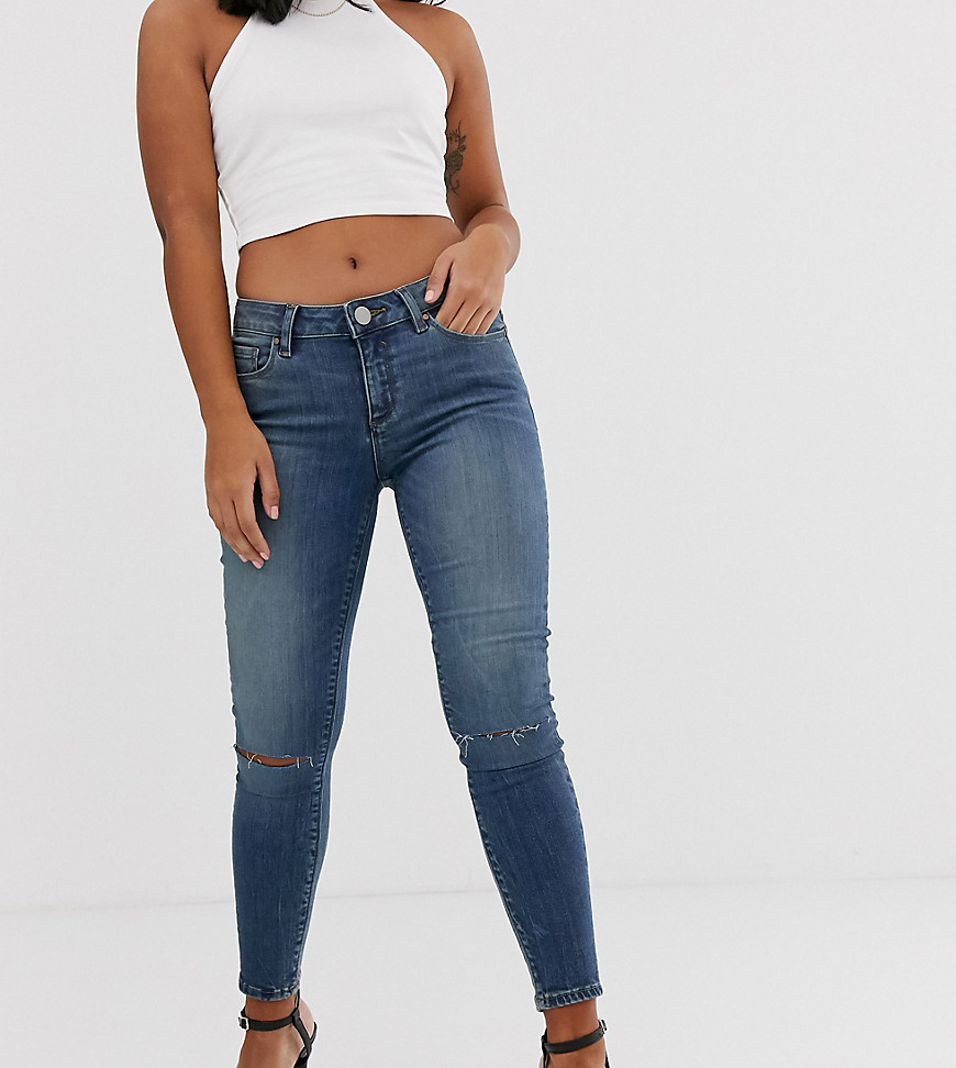 ASOS DESIGN Petite Lisbon mid rise skinny jeans in extreme dark stonewash with knee rips