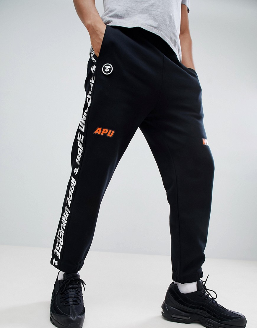 AAPE By A Bathing Ape joggers with taping in black - Black