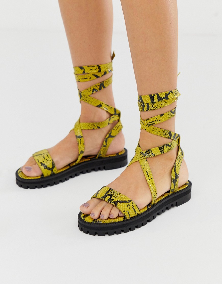 ASOS DESIGN Faster leather chunky tie leg sandals in yellow snake