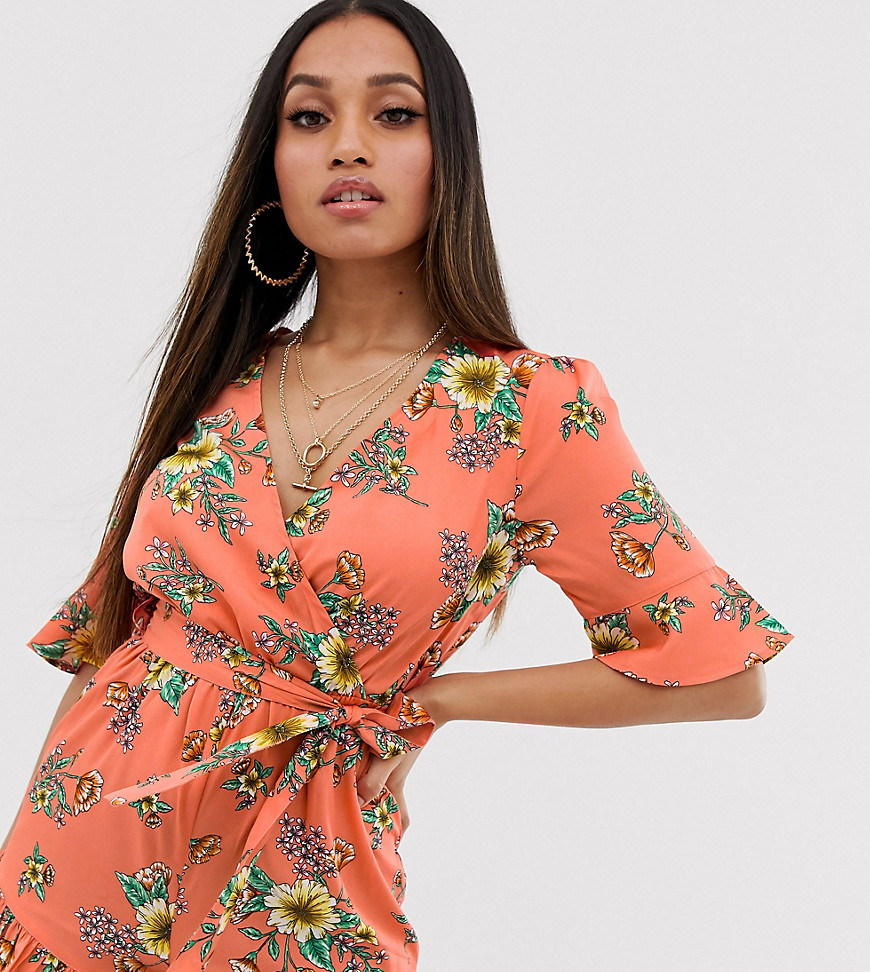 PrettyLittleThing Petite wrap playsuit with frill detail in coral sunflower print