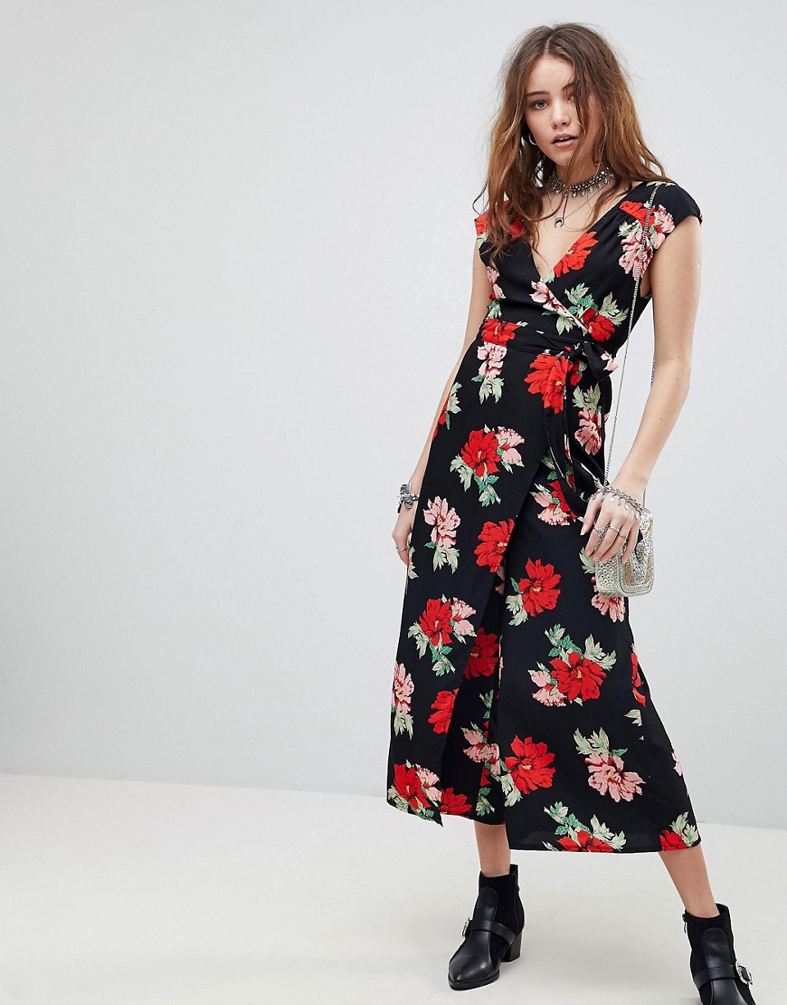 Kiss The Sky Deep V Wrap Front Jumpsuit In Floral Print