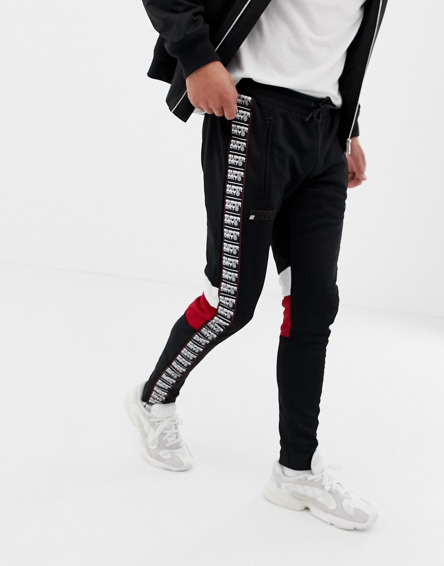 Superdry tricot taped joggers in black