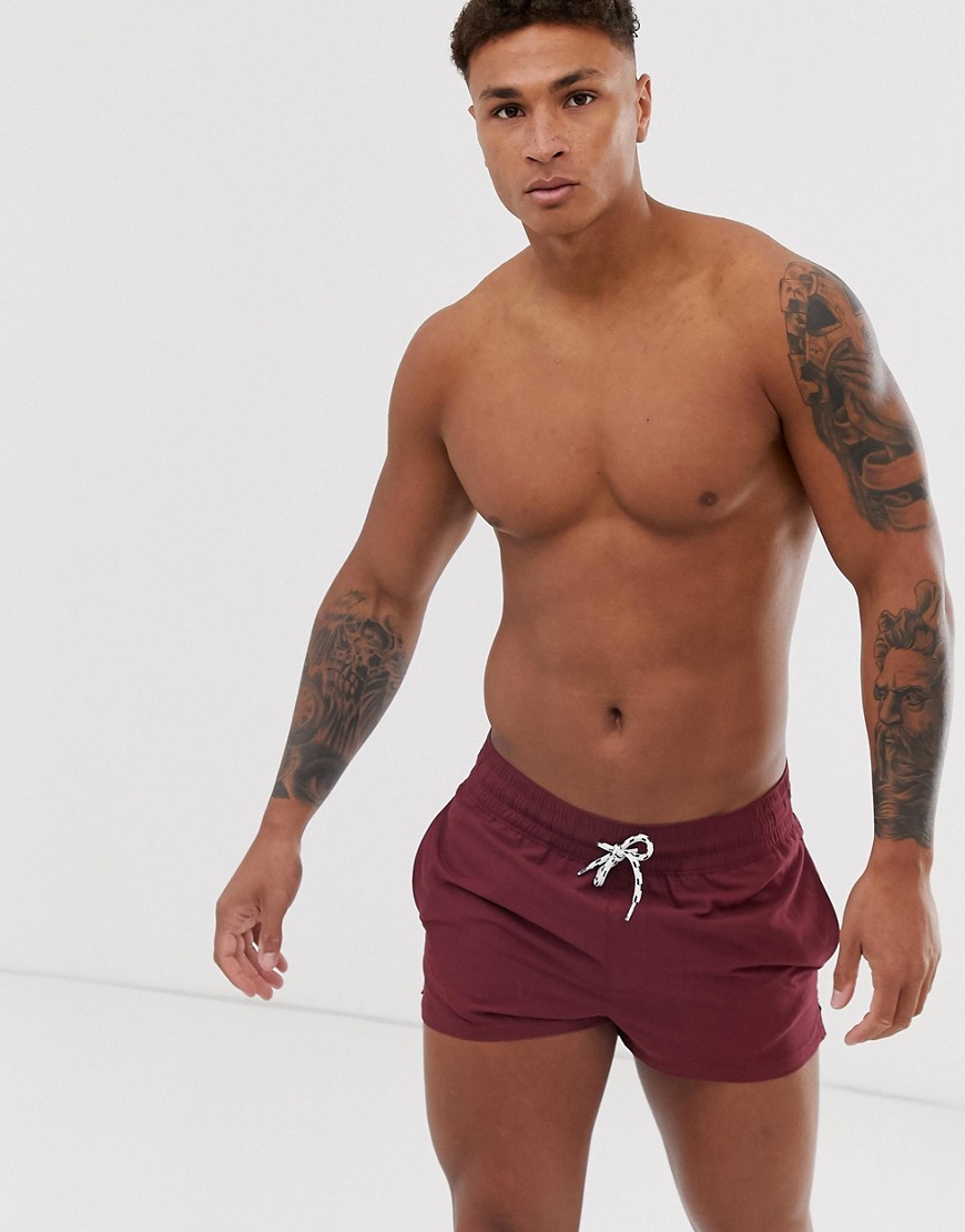 ASOS DESIGN swim shorts in burgundy super short length with black & white drawcord