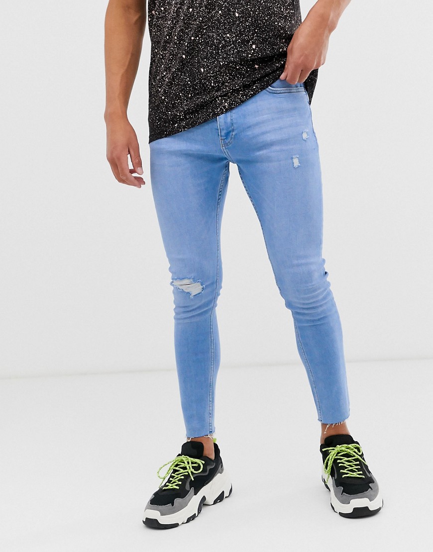 Bershka Join Life Organic Cotton super skinny jeans with knee rip and abrasions in light blue