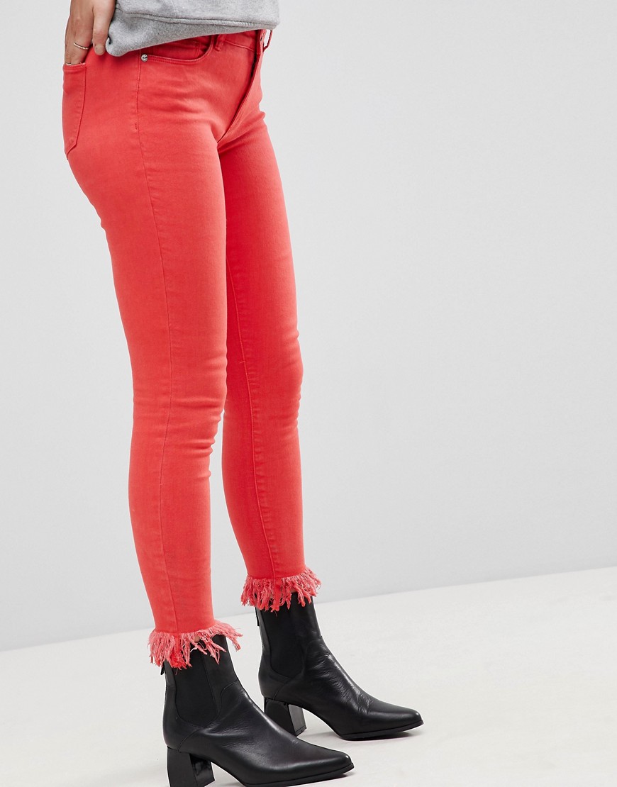 Only skinny jeans with frayed hem in red