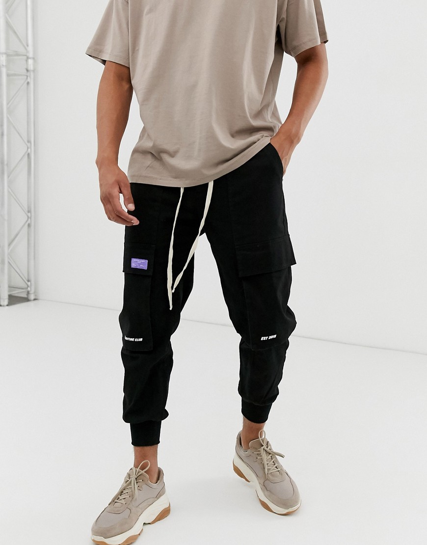 The Couture Club utility trousers in black