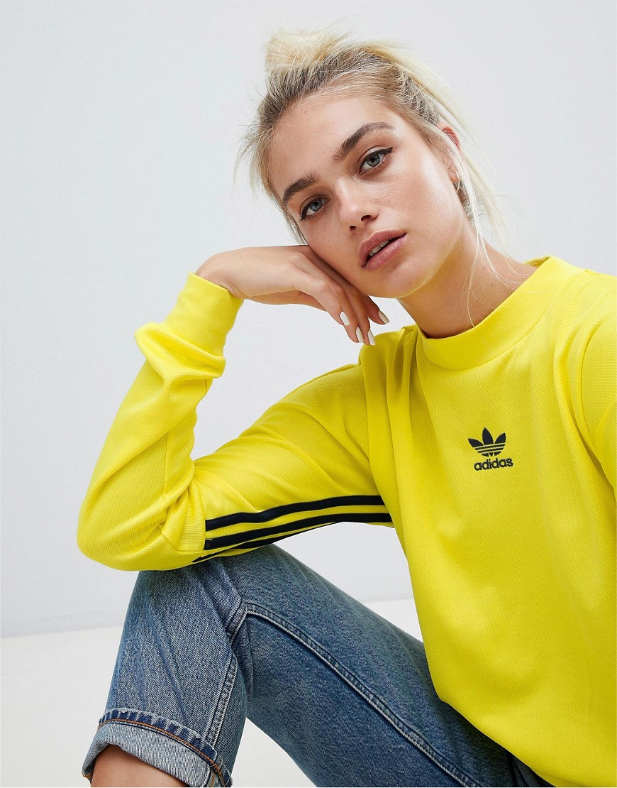 adidas originals authentic three stripe high neck sweatshirt in yellow