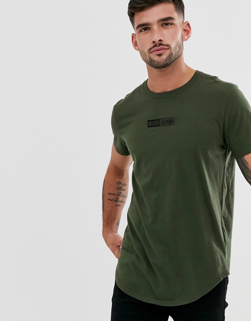 Hollister scrunch box chest logo curved hem t-shirt in green