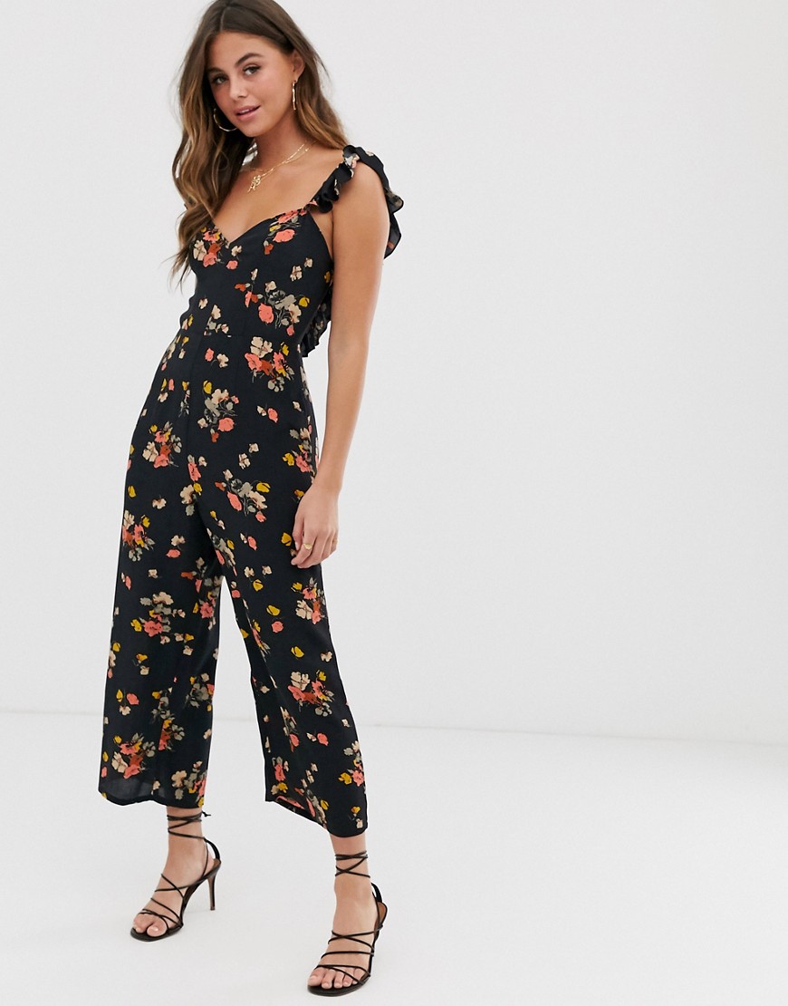 ASOS DESIGN jumpsuit with frill strap and tie back in dark floral print