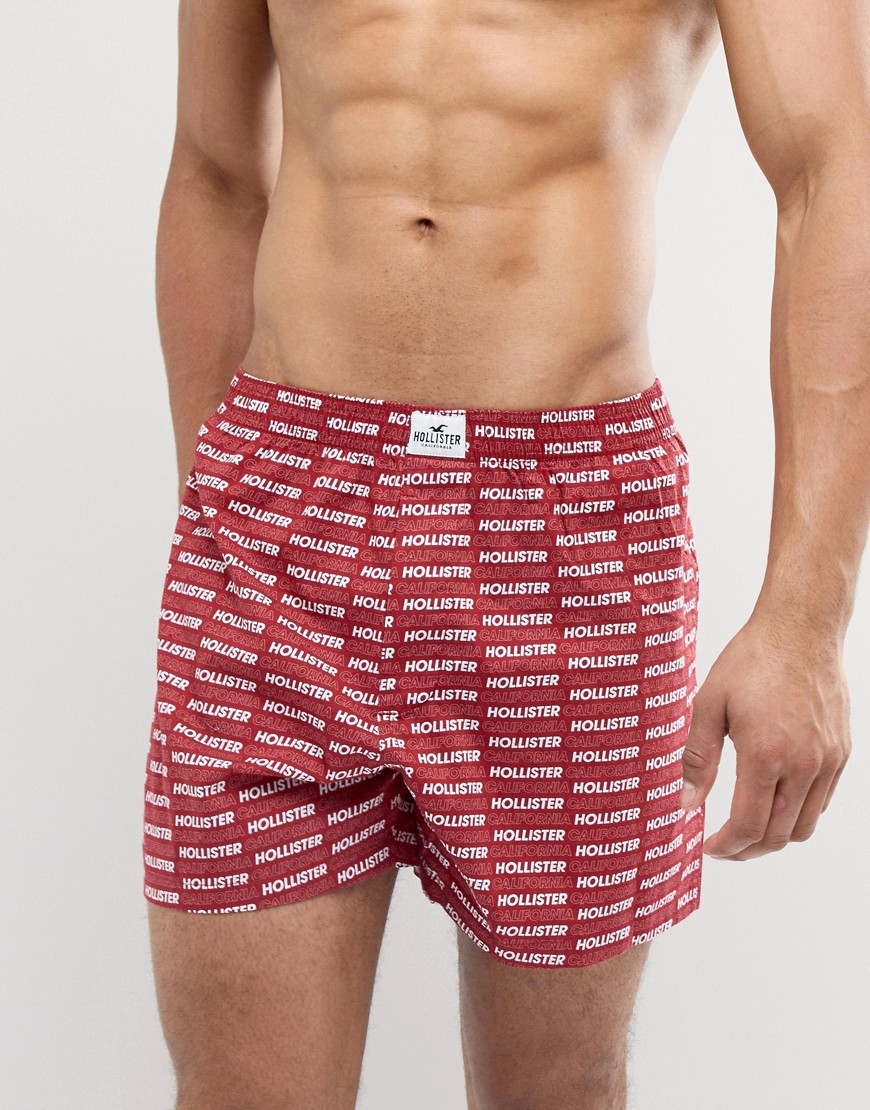 Hollister all over text logo woven boxer in red