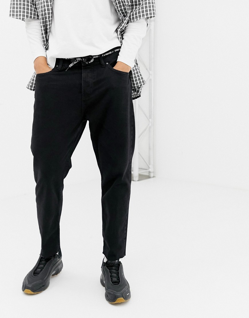 Bershka slim fit cropped jeans in black with shoe lace belt - Black