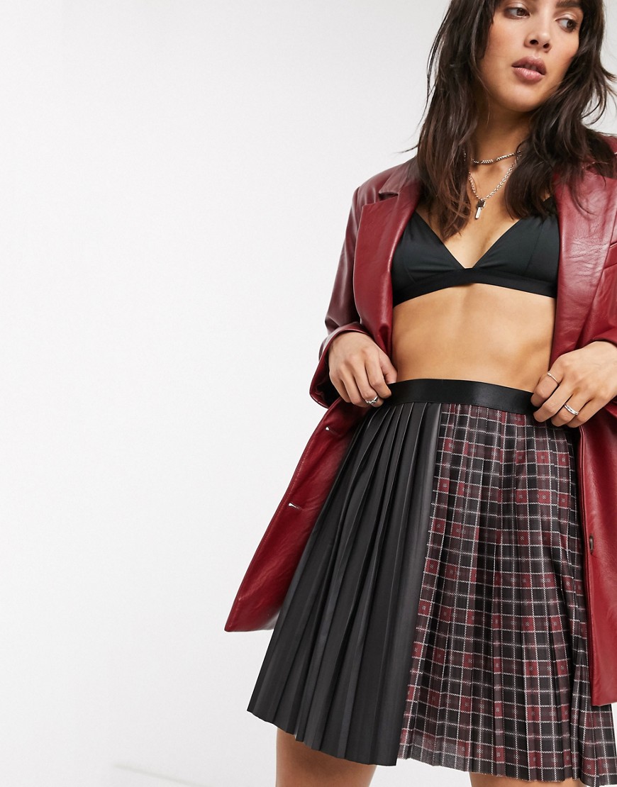 ASOS DESIGN leather look and check pleated mini skirt