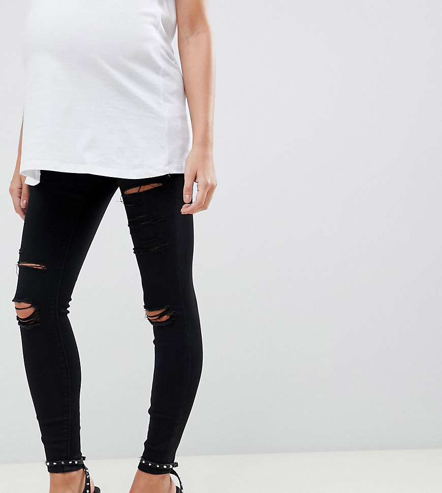 ASOS DESIGN Maternity high rise ridley 'skinny' jeans in black with shredded rips and under the bump waistband