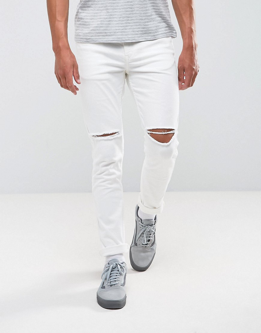 Белые рваные джинсы скинни Antioch - Белый 