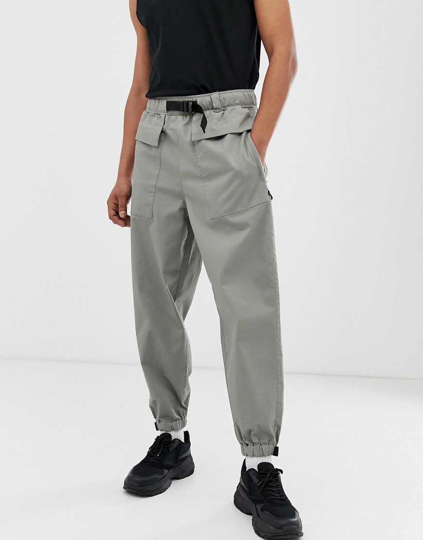 ASOS DESIGN tapered utility trousers in light green