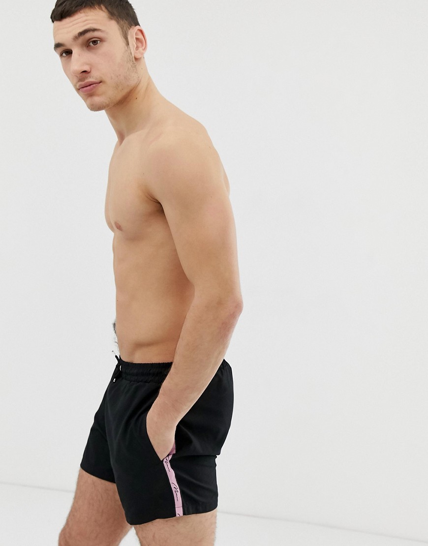 boohooMAN swimshorts with man signature in black