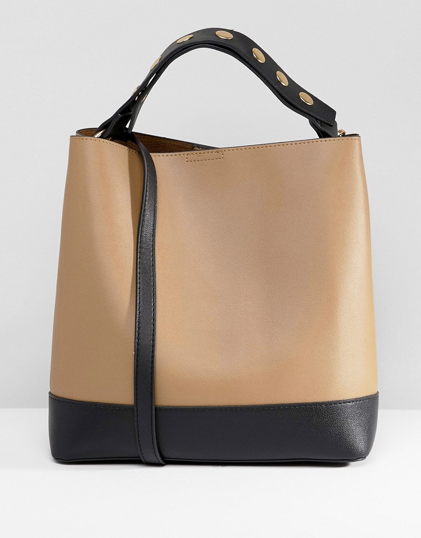 Warehouse bucket bag with popper strap in tan