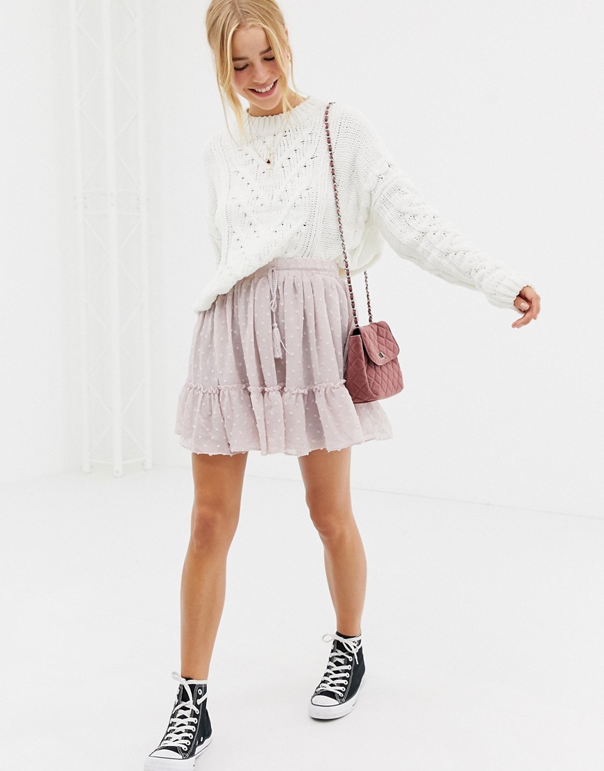Glamorous ruffle mini skirt with dobby mesh overlay