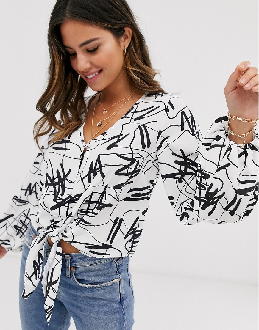 ASOS DESIGN long sleeve button through top with tie detail in abstract print