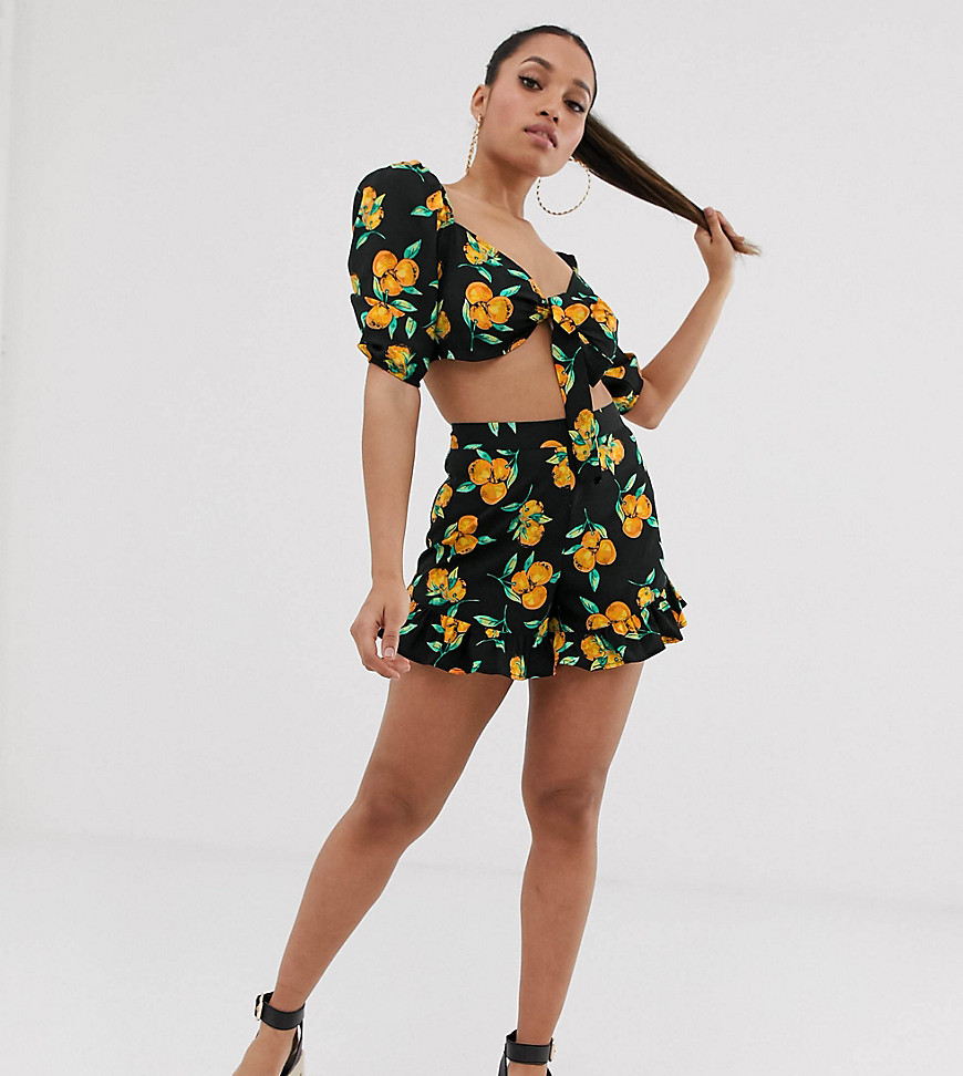 PrettyLittleThing Petite co-ord shorts with frill detail in fruit print