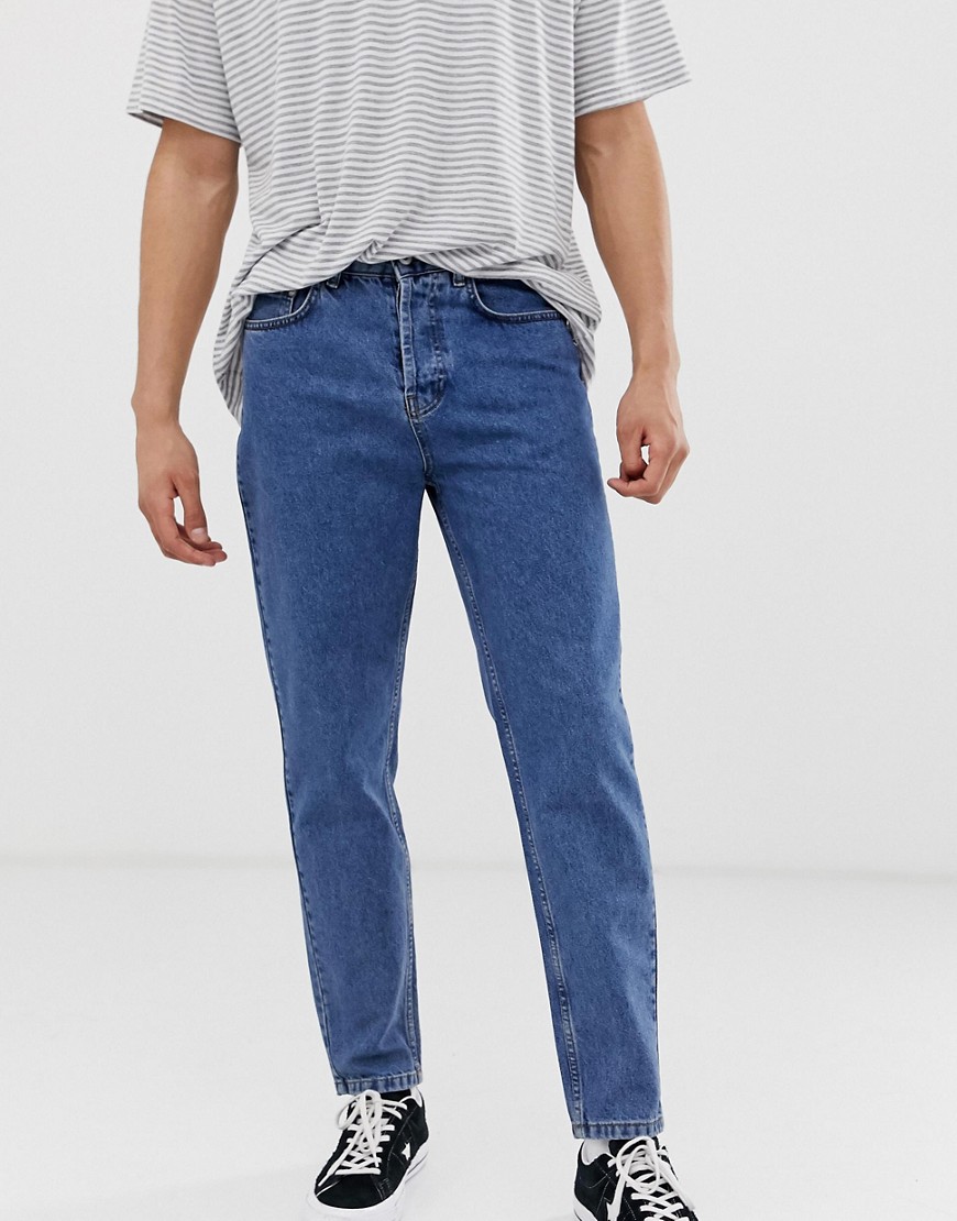 Solid tapered dad fit jeans in mid blue wash