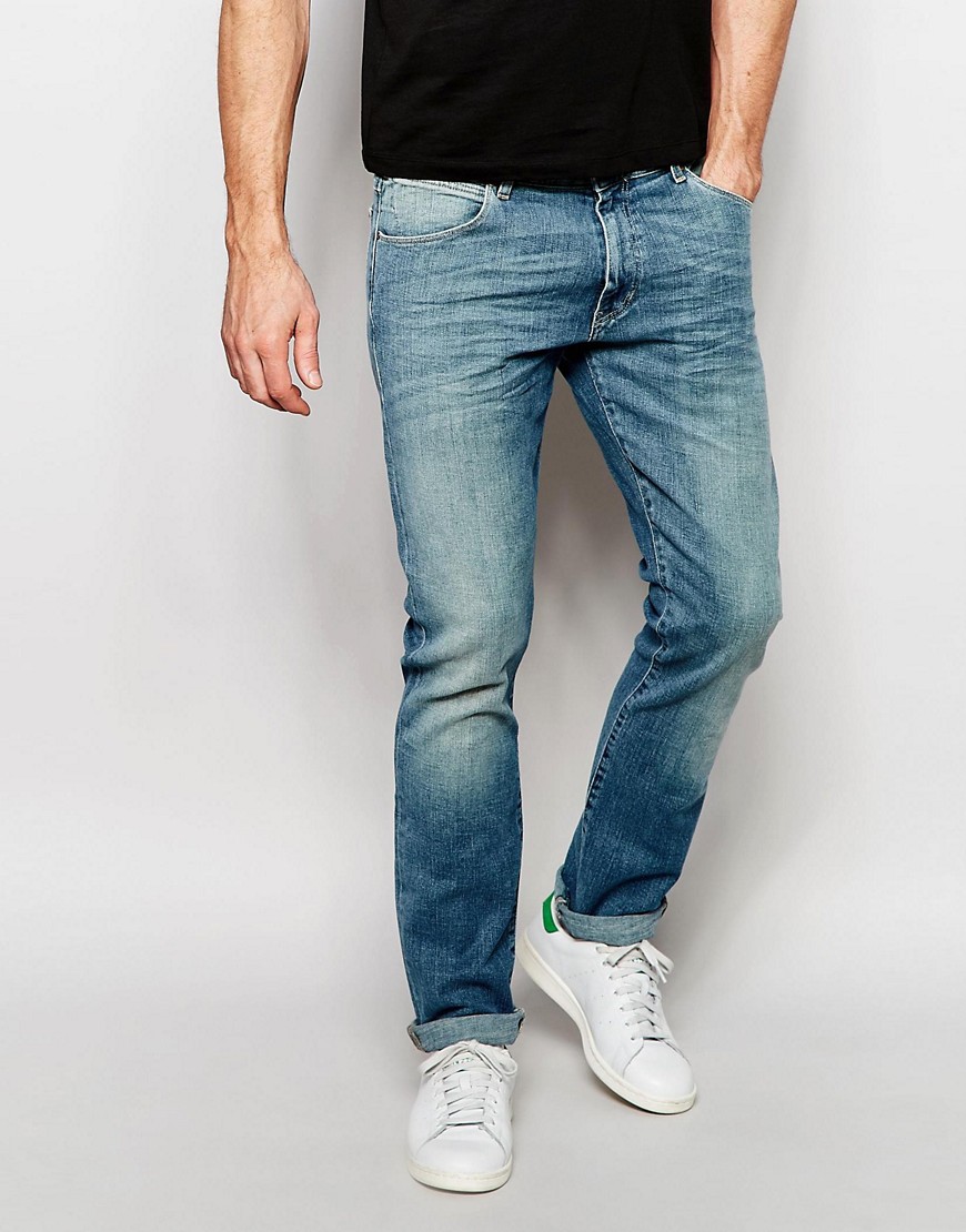 Wrangler | Wrangler Larston Slim Tapered Jeans in Green Bay at ASOS