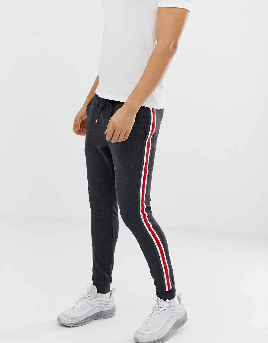 ASOS DESIGN super skinny joggers with side stripe in charcoal