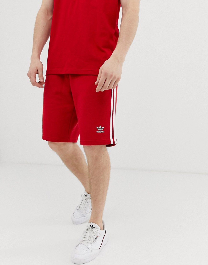 white adidas shorts with red stripes