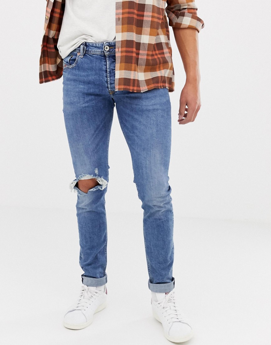 Diesel Sleenker skinny fit jeans in 084AI with abrasions