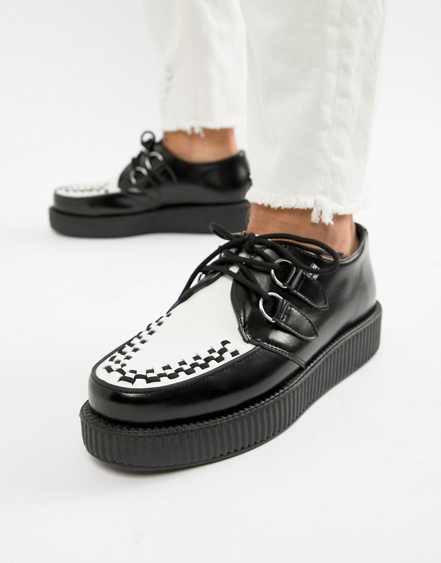 T.U.K creepers in black leather with white vamp