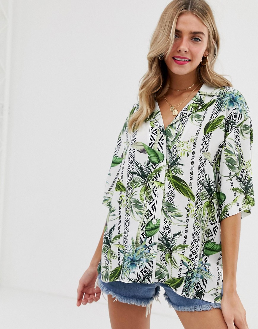 ASOS DESIGN short sleeve longline shirt in hawaiian tropical print