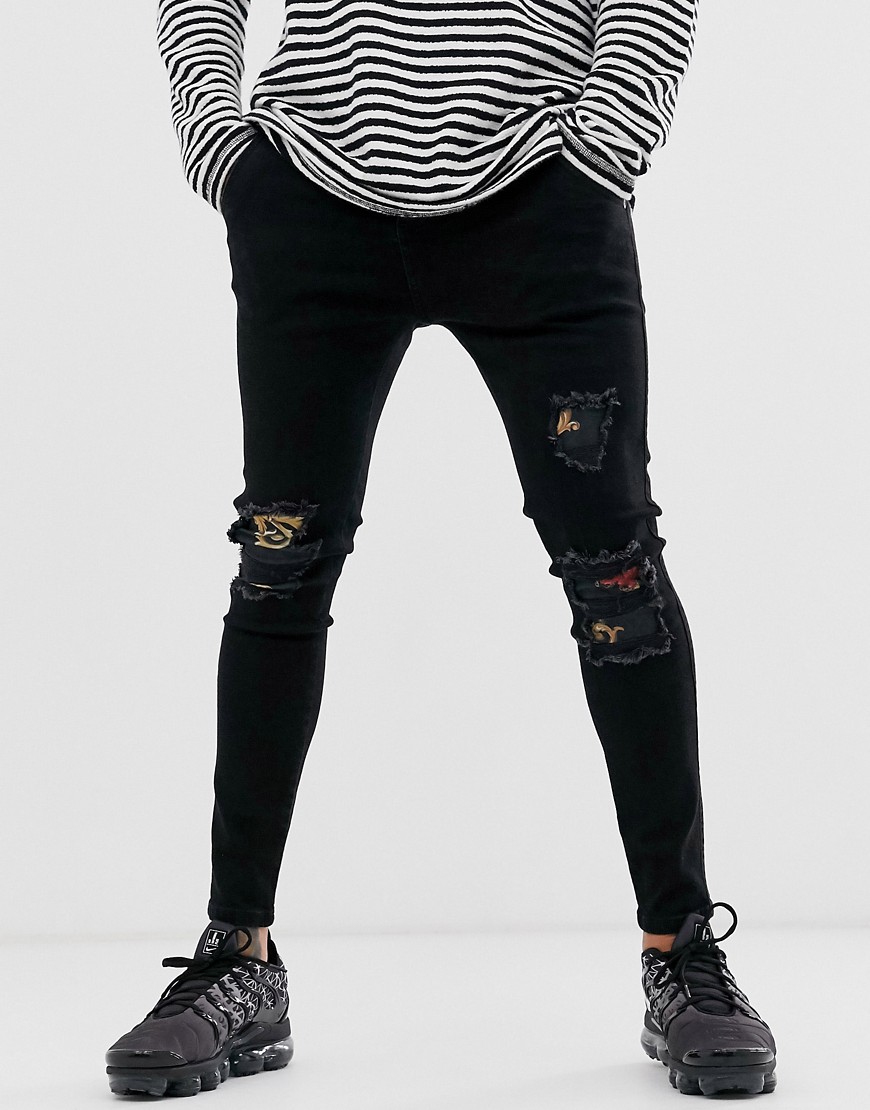 SikSilk x Dani Alves skinny jeans in black with floral patches