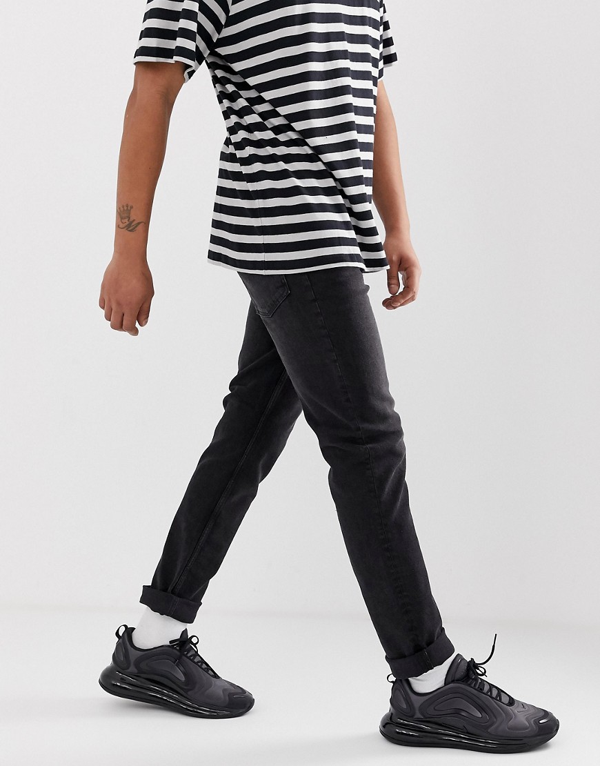 Cheap Monday sonic slim tapered jeans in black mode