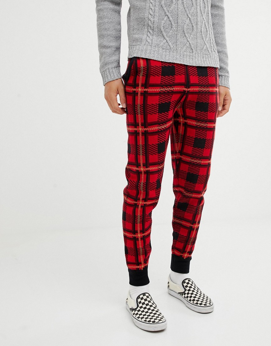 ASOS DESIGN knitted joggers in red check