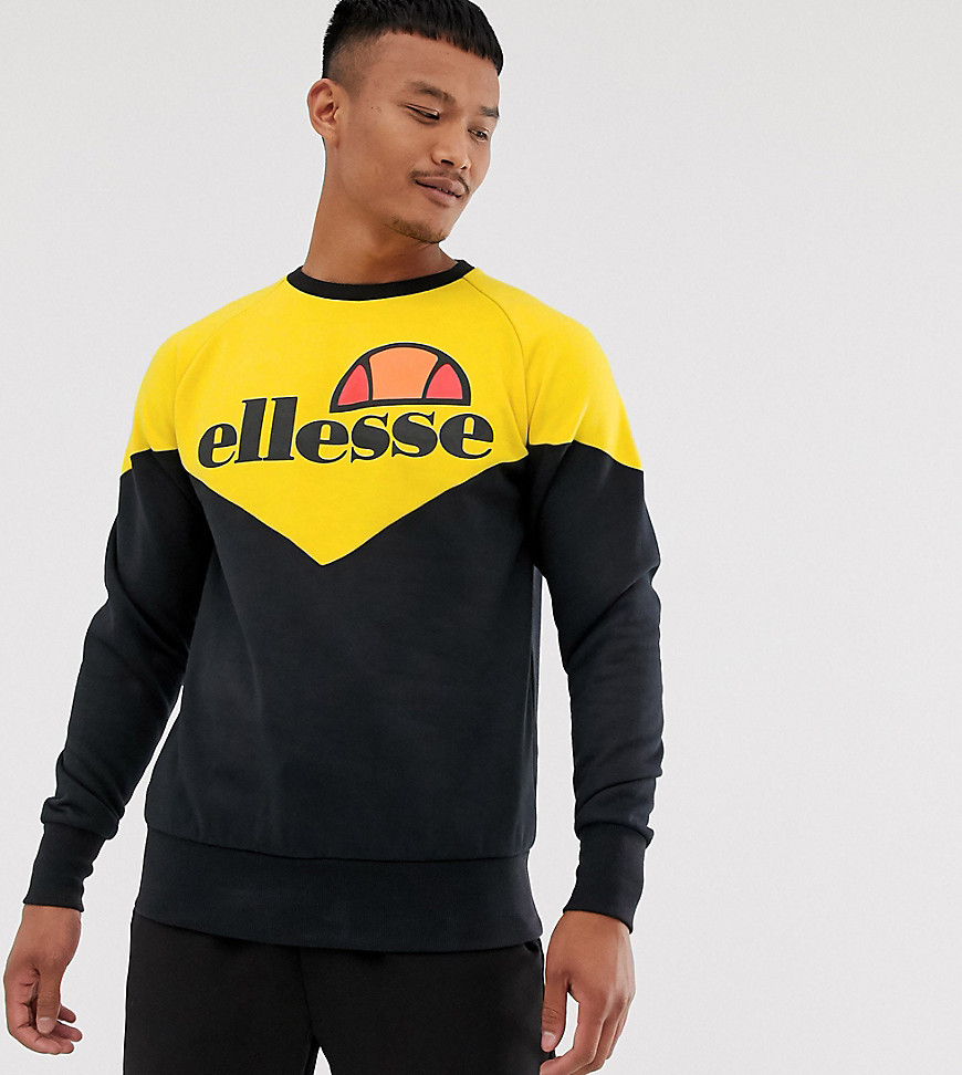 ellesse Fillipo recycled cut and sew sweatshirt in black/yellow exclusive at ASOS