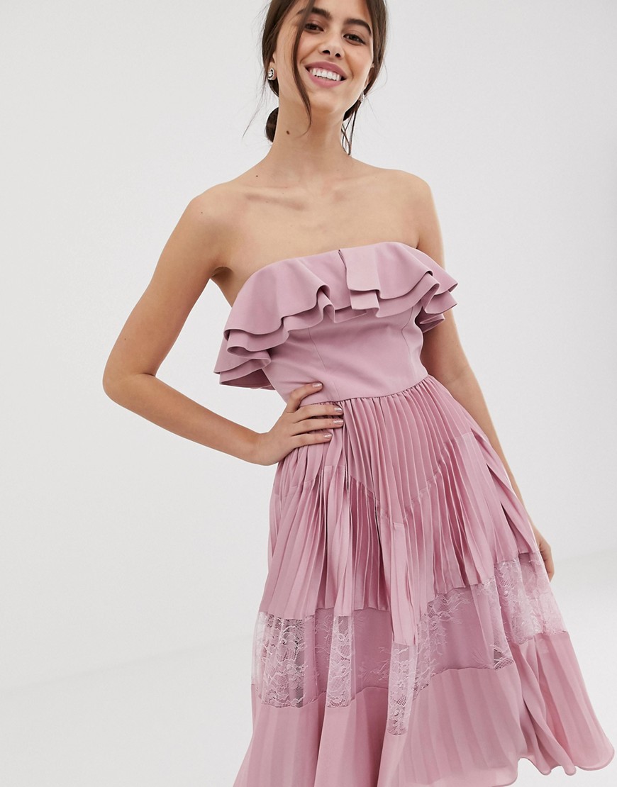 True Decadence premium sleeveless dress with ruffle trim and lace insert pleated skirt in pink