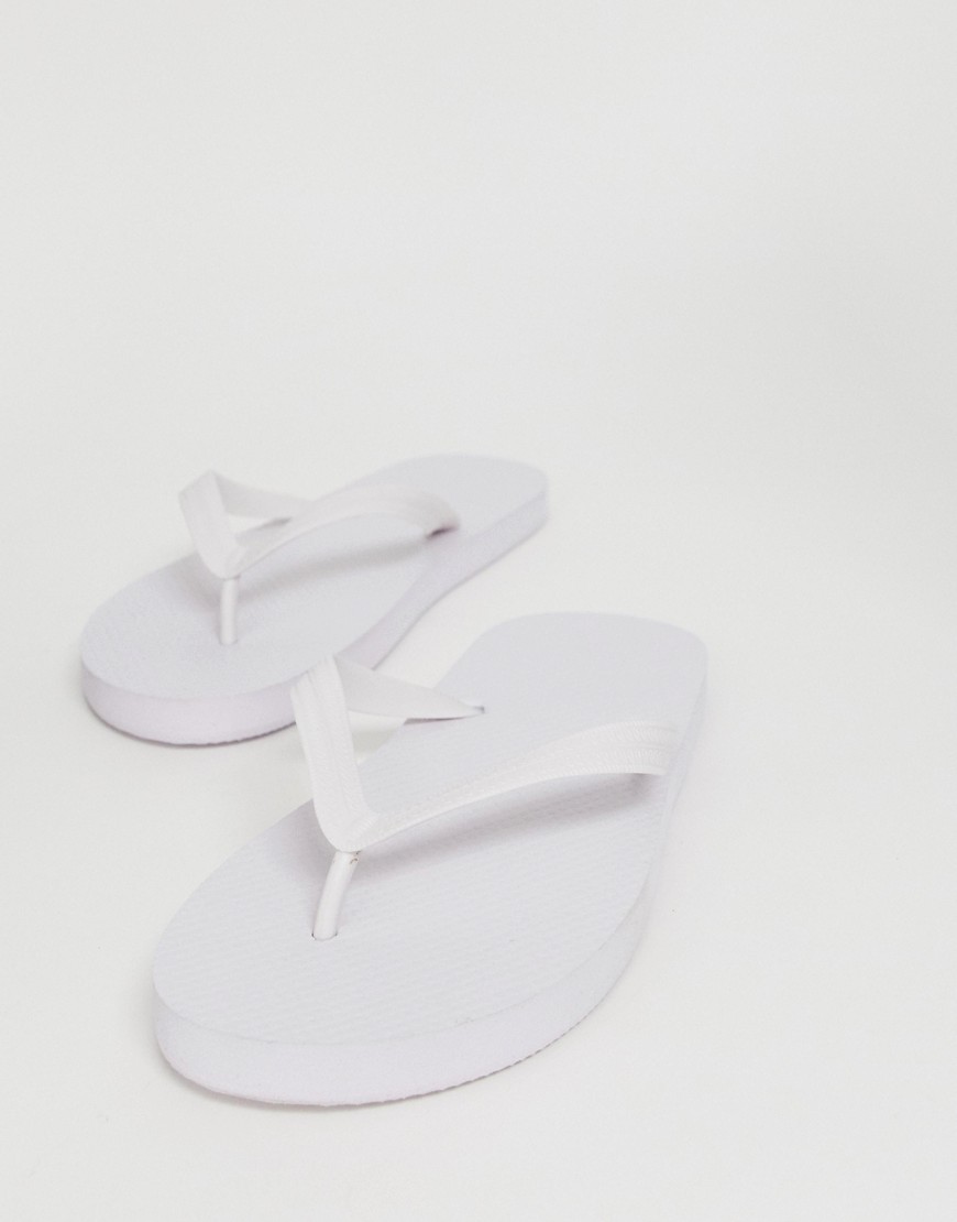 Asos Design Flip Flops In White | ModeSens