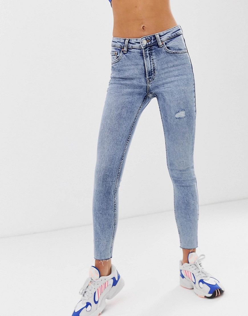 Bershka distressed skinny jean in washed blue