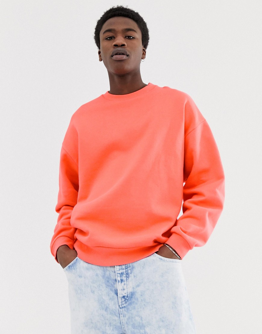 ASOS DESIGN oversized sweatshirt in pink