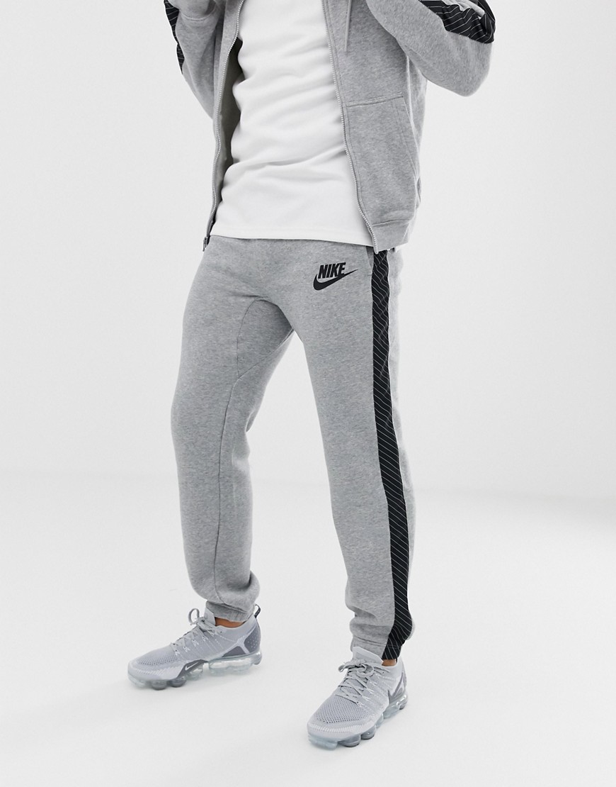 Nike Joggers With striped Side Tape In Grey BQ0679-063