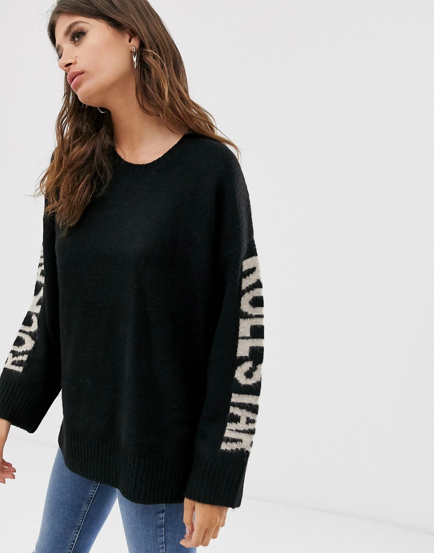 Religion oversized jumper with rock and roll slogan