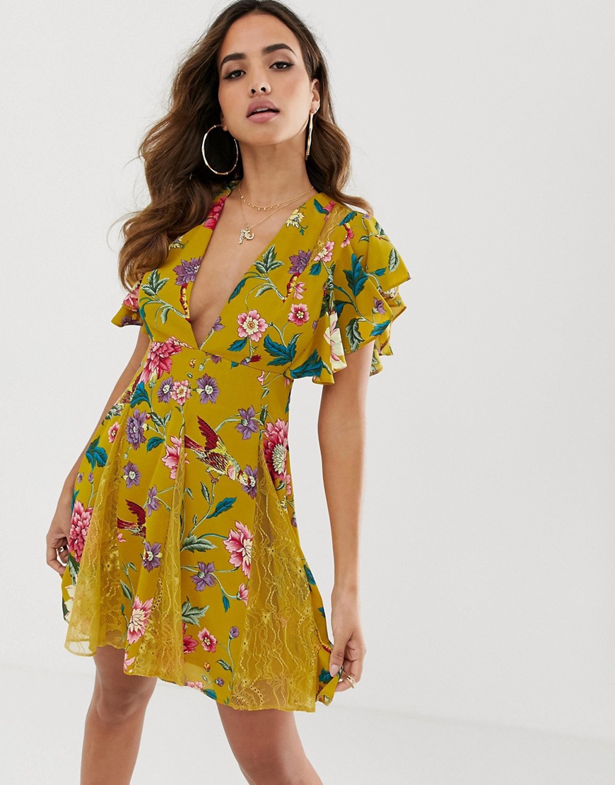 ASOS DESIGN mini dress with godet lace inserts in yellow floral print