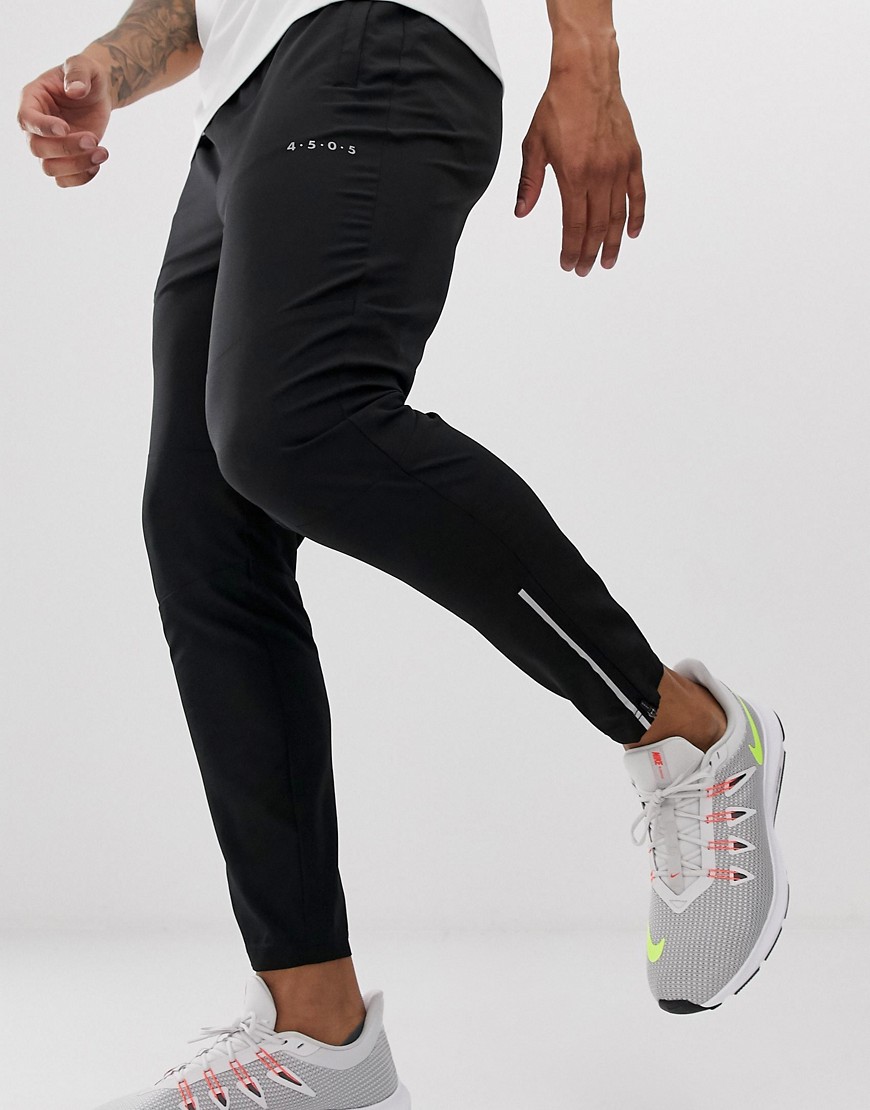 ASOS 4505 woven skinny tapered running joggers with reflective zip detail in black