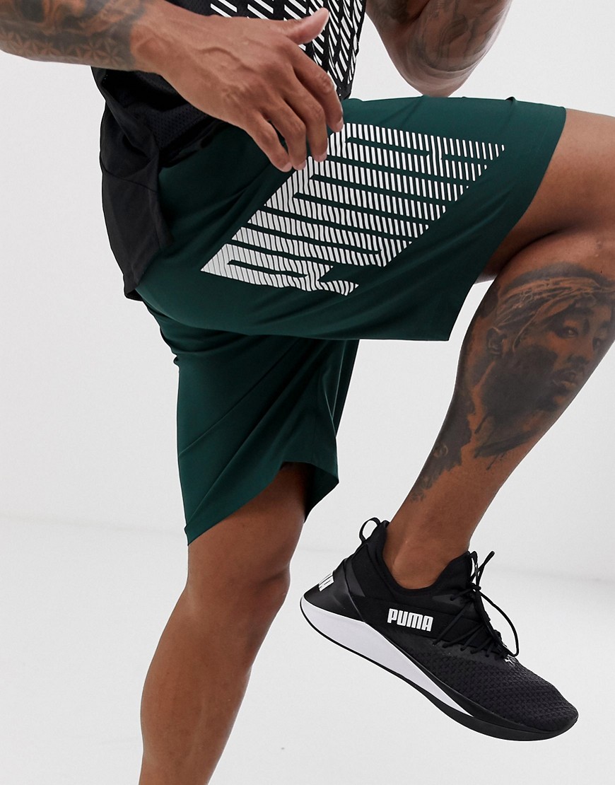 Puma training logo woven 9 inch shorts in green