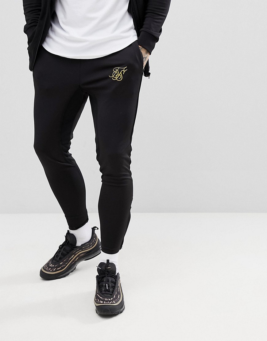 SikSilk skinny joggers in black with gold logo