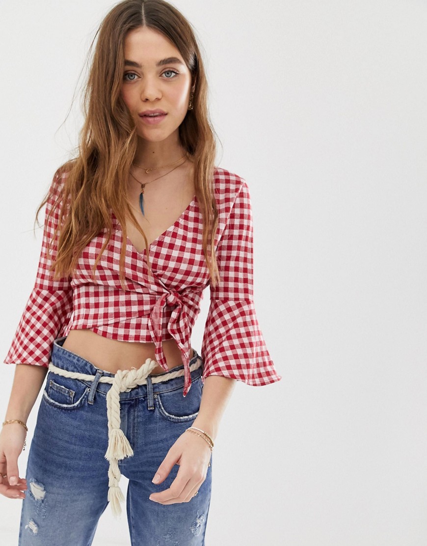 Gilli wrap front blouse in gingham with flare sleeves