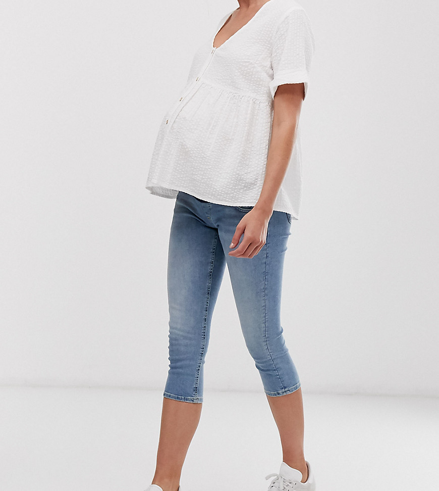 ASOS DESIGN Maternity lisbon mid rise cropped skinny jeans in mid stone wash with under the bump waistband