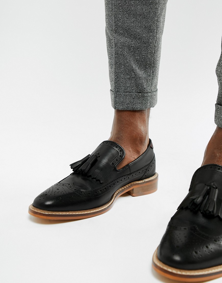 ASOS DESIGN loafers in black leather with natural sole and fringe detail