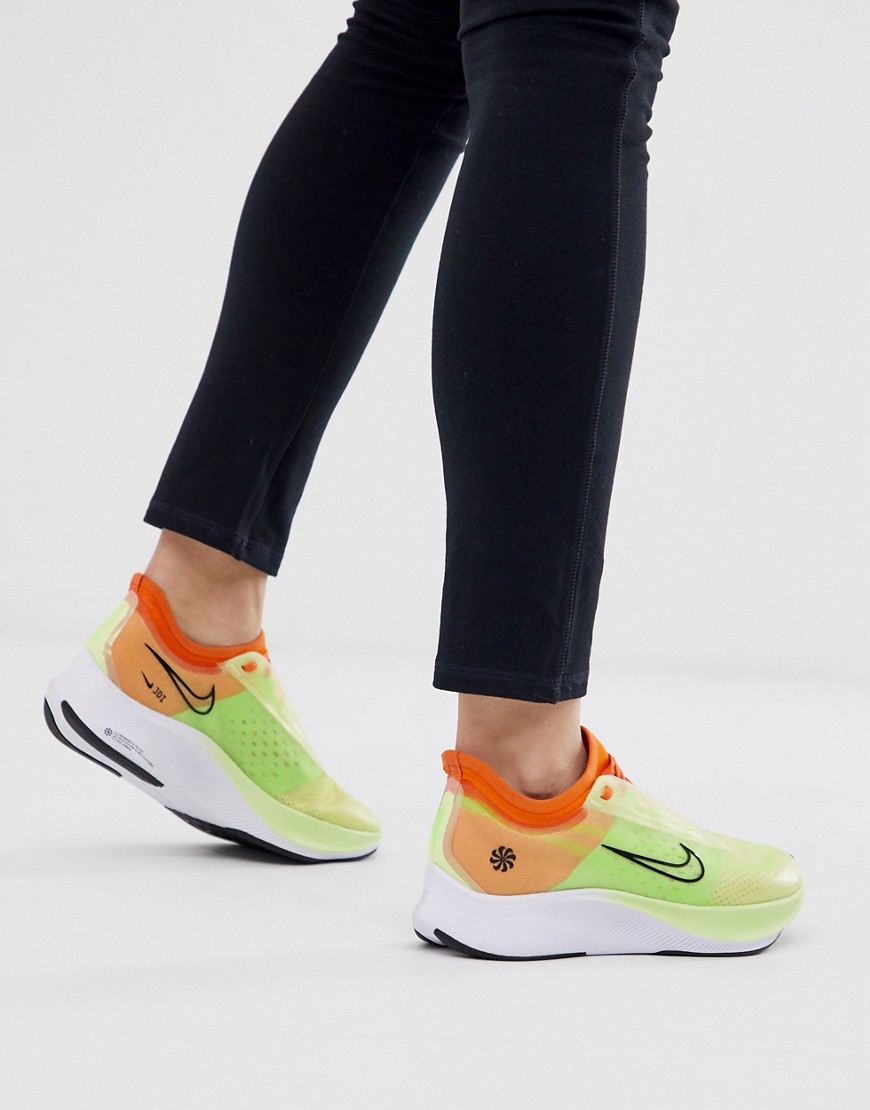 Nike Running zoom fly trainers in lime and orange